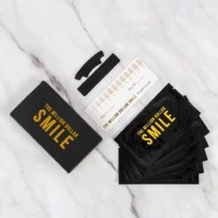The Million Dollar Smile® - Teeth Whitening Strips - Crest Whitestrips -Tandenbleken - 28 Bleekstrips - 14 Behandelingen - Professionele Tandenbleek Strips - Tandenblekers - Wittere Tanden - Zonder Peroxide - Tanden Bleken - -Verzorgingsproducten 1200x1200 1611